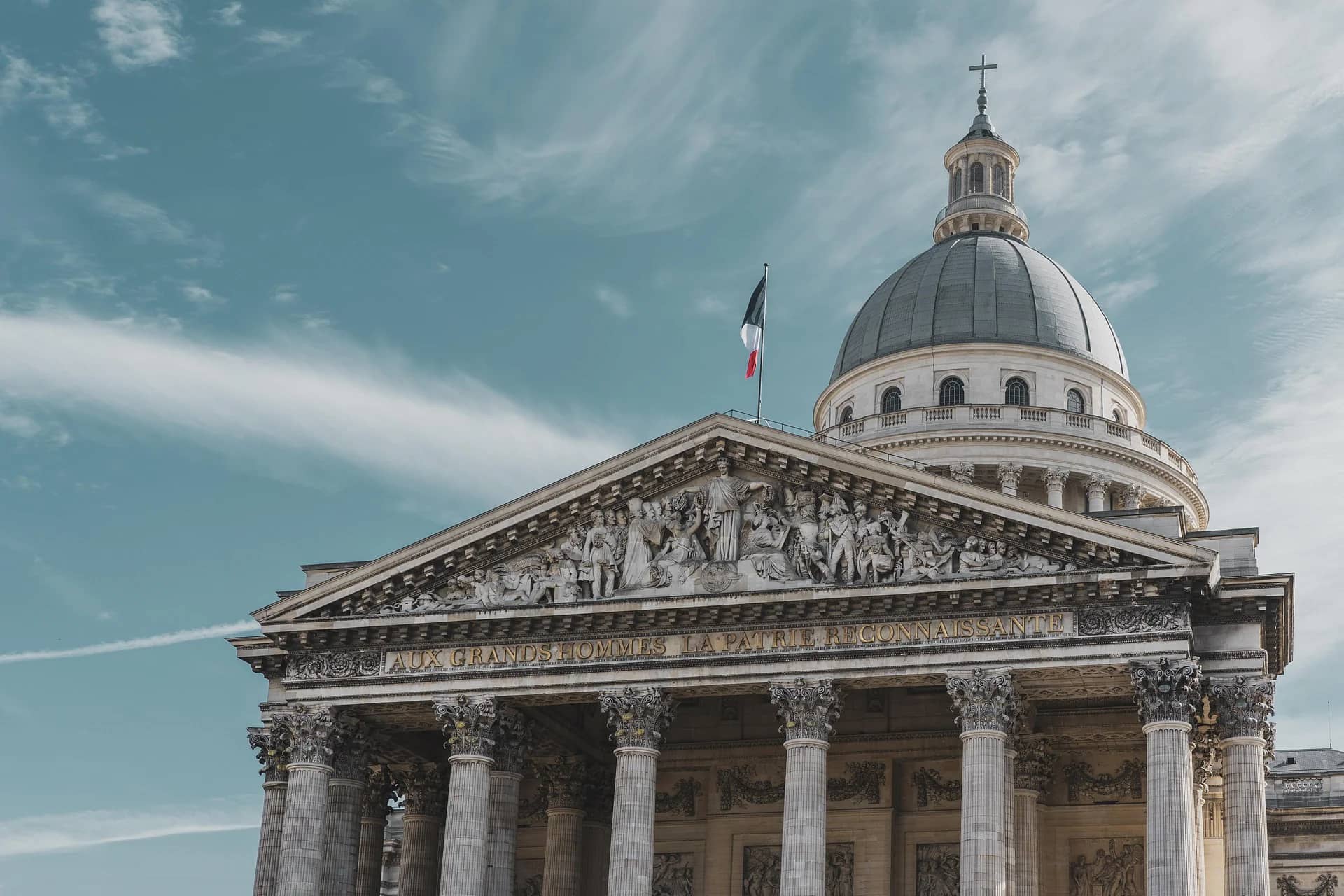 Neoclassical portico and dome of the Panthéon rising above Paris