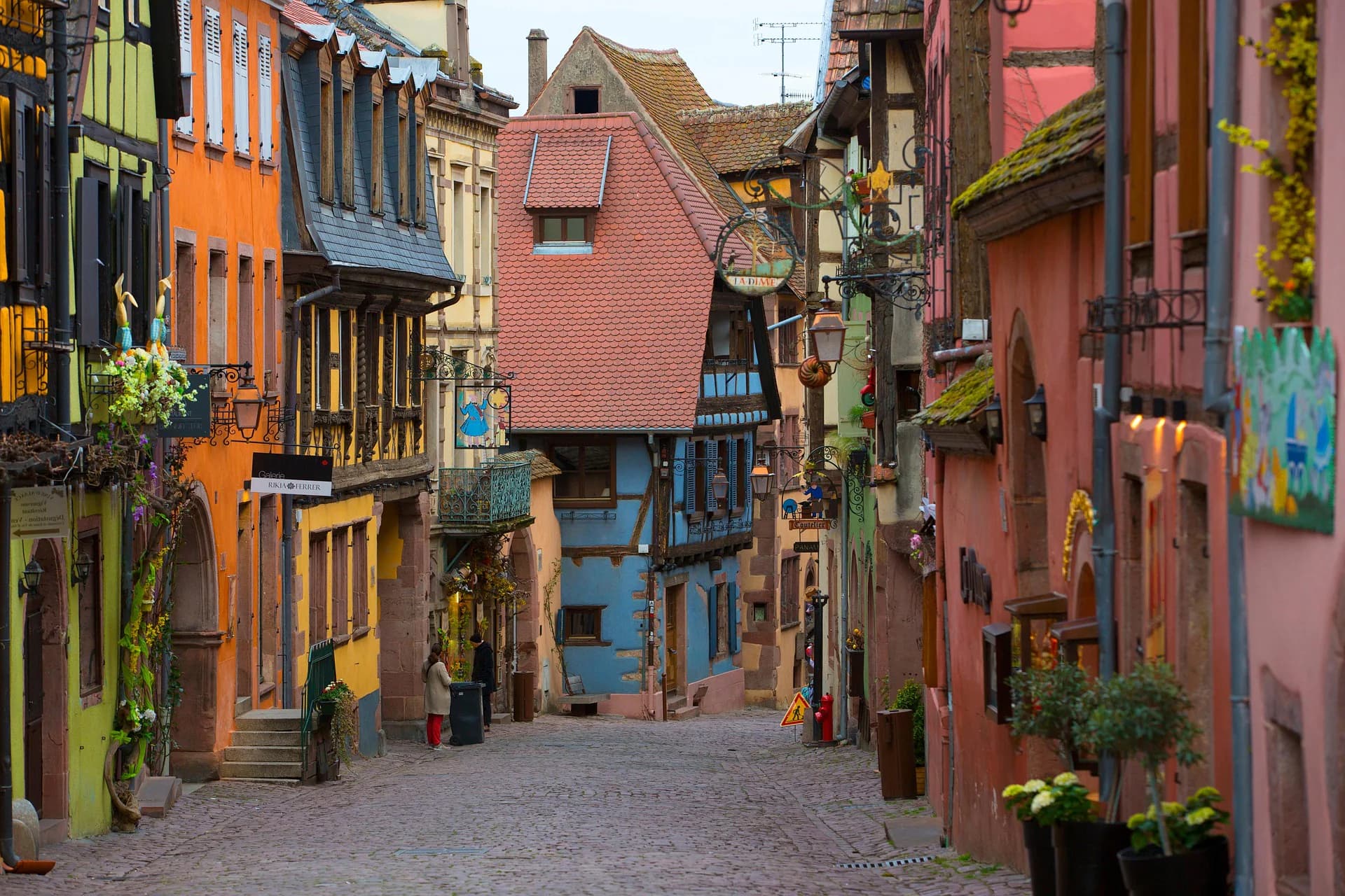 Half-timbered houses on a narrow lane in Riquewihr, Alsace, France